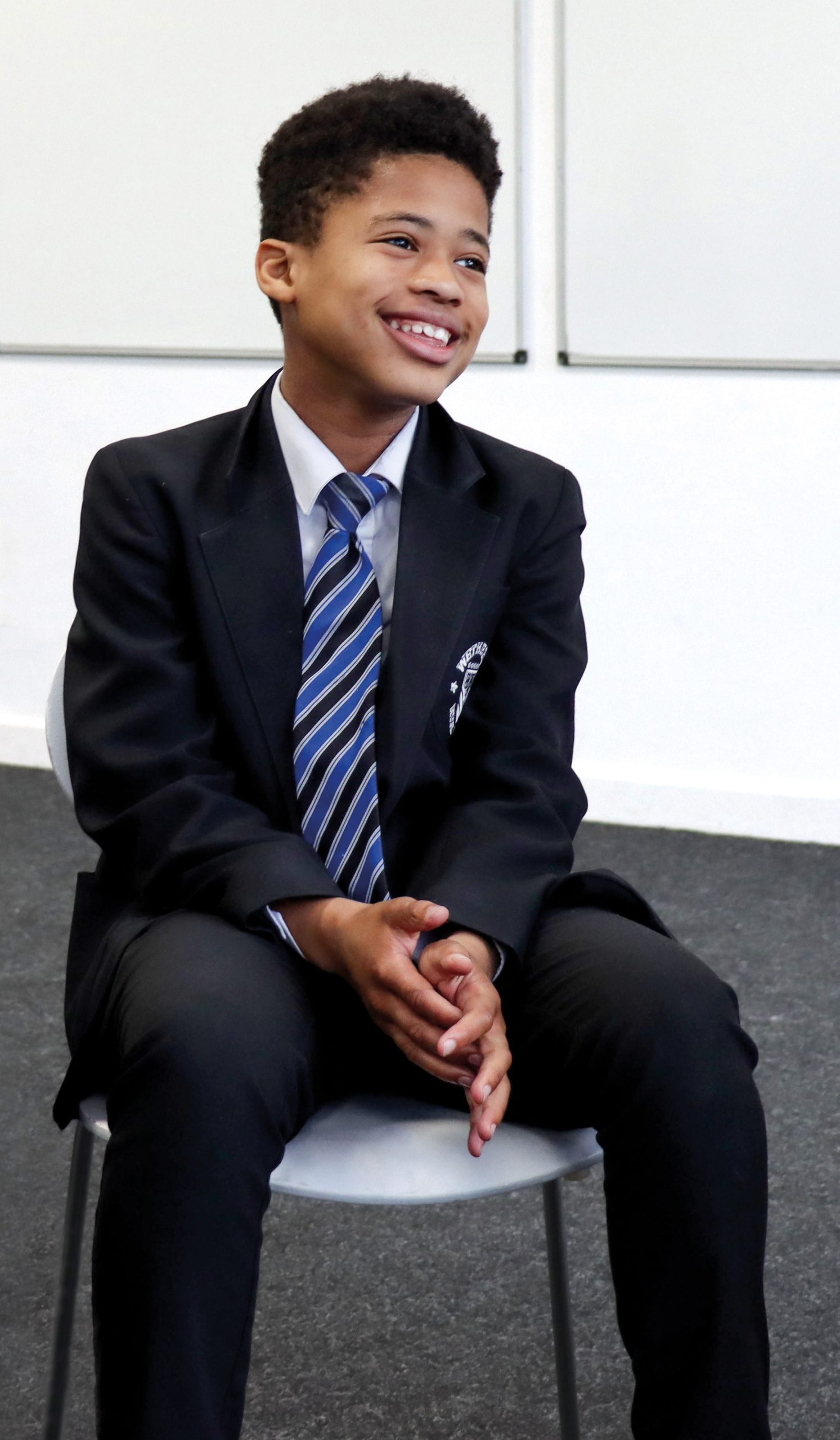 Smiling boy looking to his right